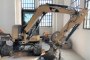Caterpillar Mini Excavator with Demolition Hammer 1