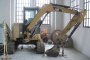 Caterpillar Mini Excavator with Demolition Hammer 2